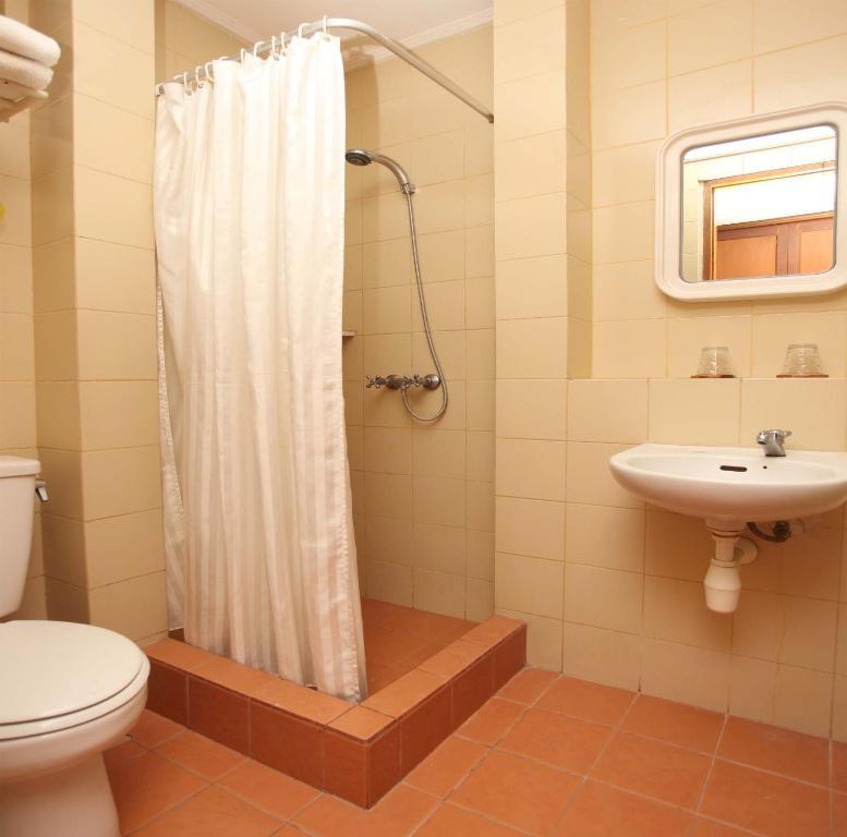 Balira Airport Hotel Кута Номер фото