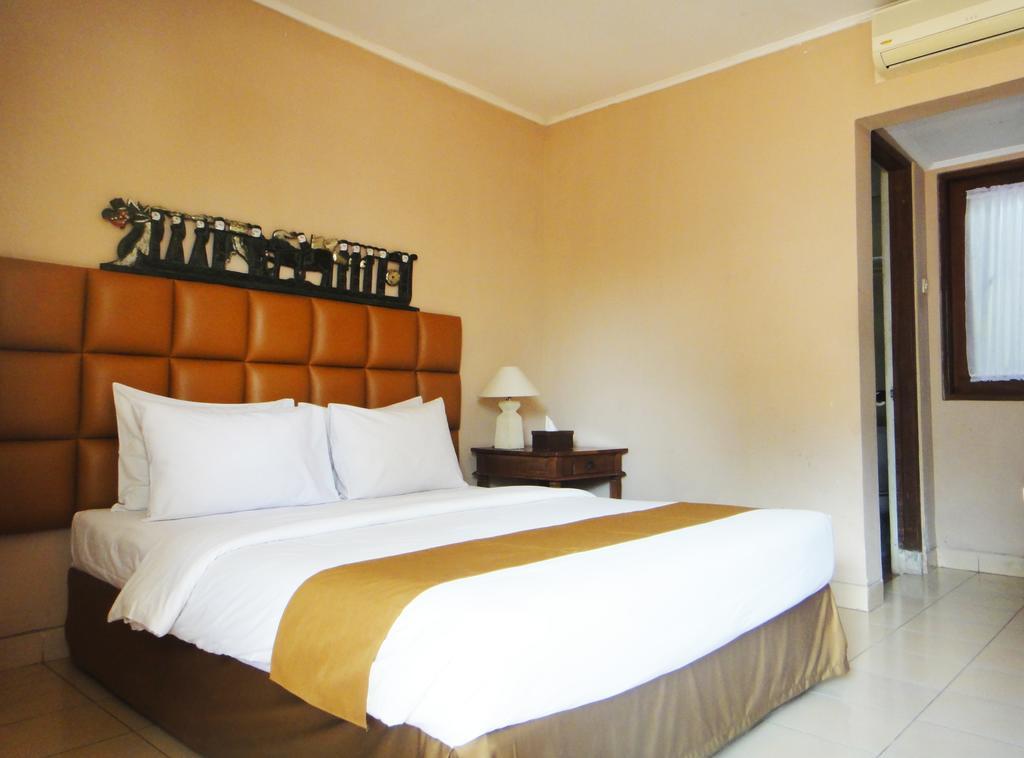 Balira Airport Hotel Кута Номер фото